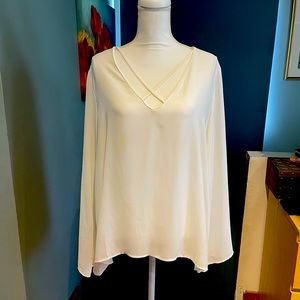 Whites blouse and long trow on cape ,vest